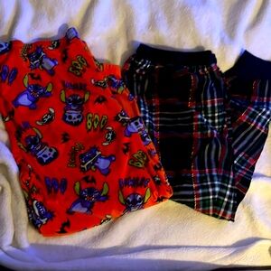 Almost new. Halloween and Xmas pajama pants. Perfect for upcoming holidays.